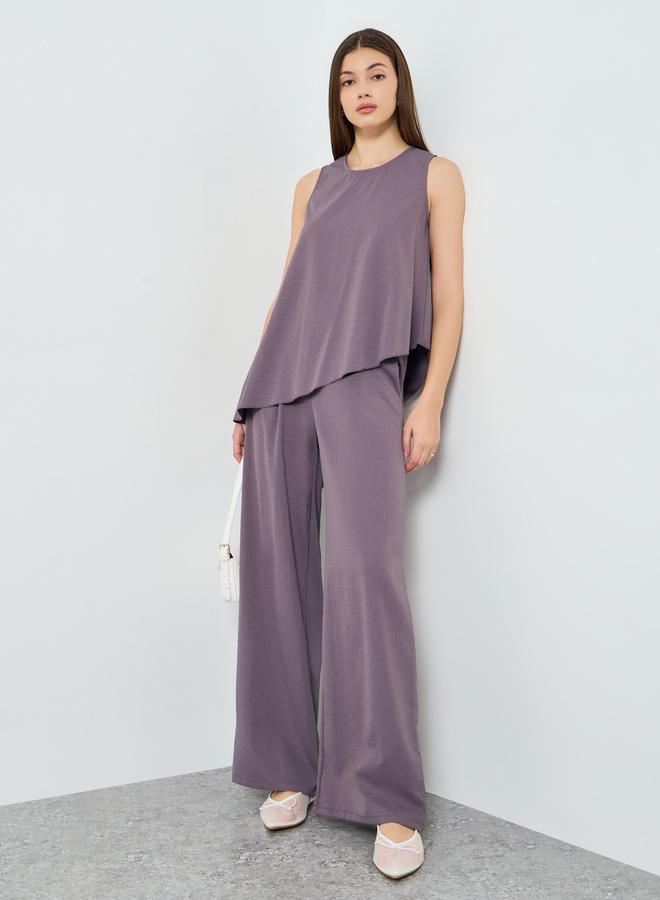 ستايلي طقم منسق من بلوزة بحافة غير متماثلة وبنطال للنساء - Image 5